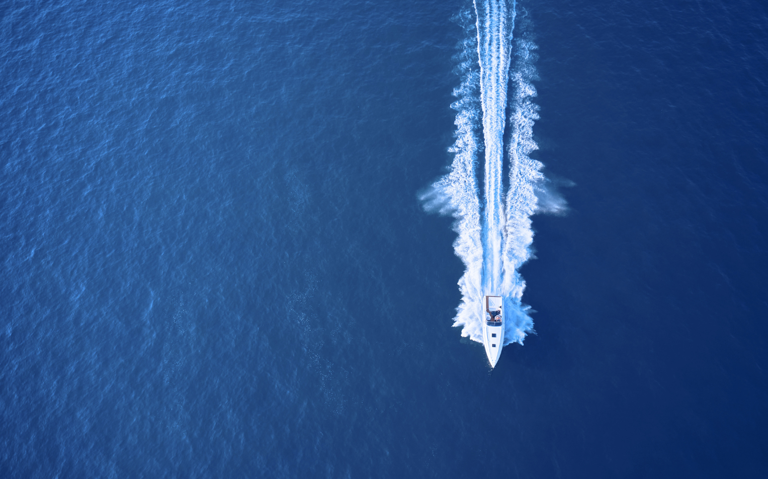 Aerial photo of a boat out at sea